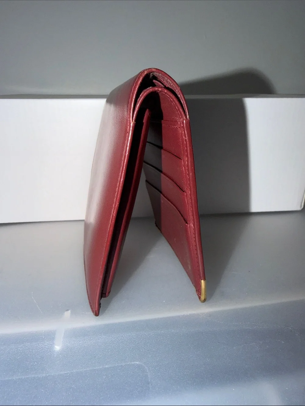 Cartier Must de Cartier Leather Bifold Wallet in Burgundy with Gold Corners